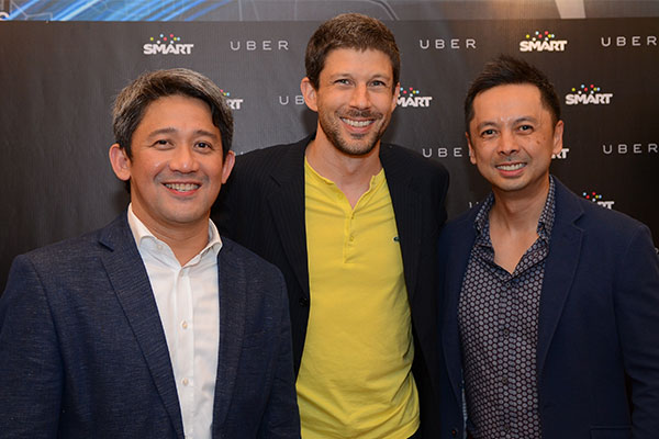 In photo: (L-R) PLDT/Smart EVP and head of Consumer Business Group Ariel P. Fermin, Uber Regional GM for Southeast Asia and Australia, New Zealand Mike Brown and Voyager Innovations FVP and group head for Business Development and International Partnerships Stephen Misa.