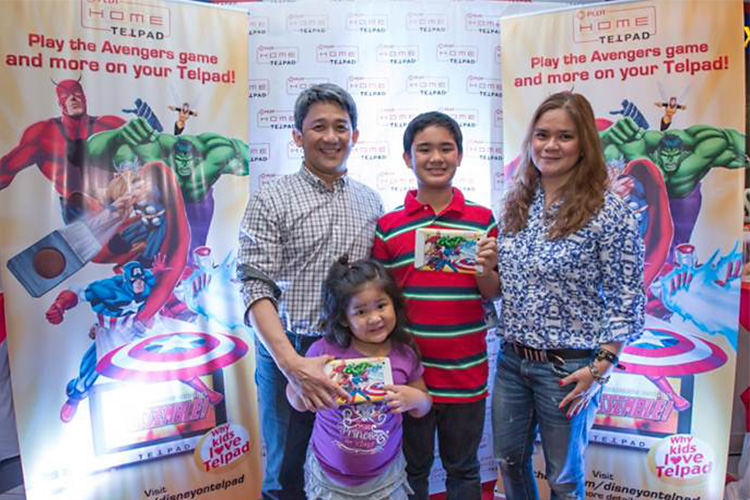 PLDT Executive Vice President and Head of Home Business Ariel P. Fermin (left) with his family