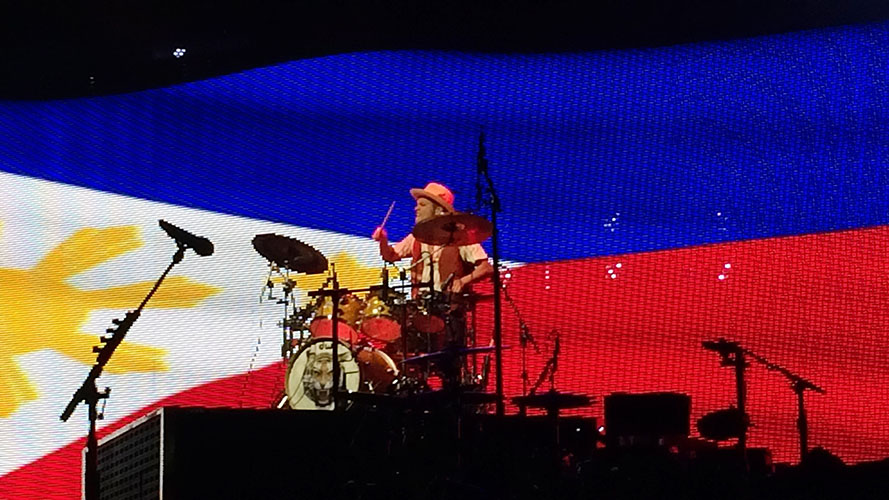 Bruno Mars performs a drum solo to the delight of the crowd