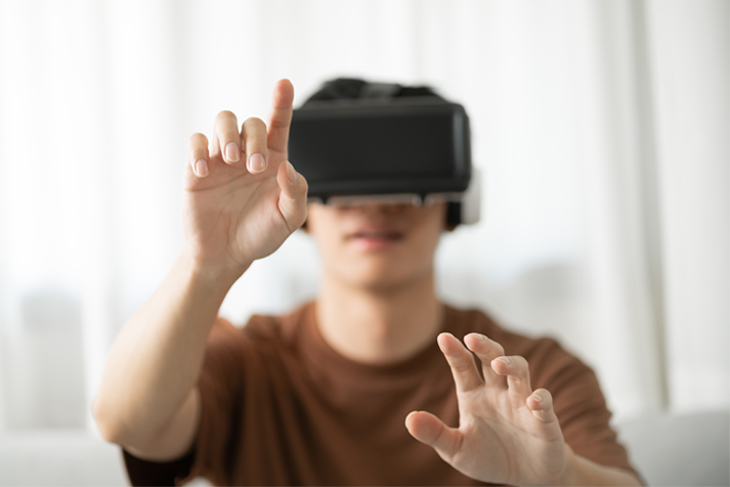 Gamer in virtual reality during the VR experience