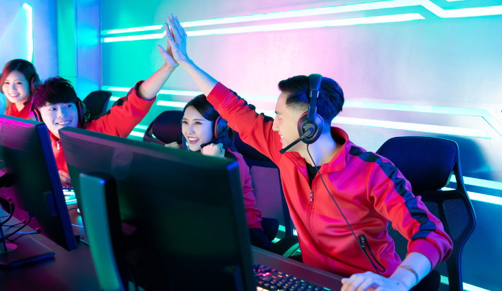 Pro gamers high five after a game
