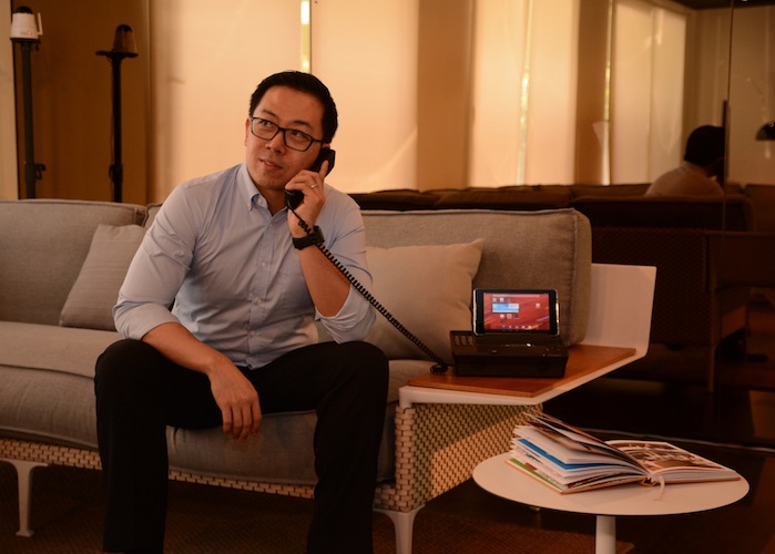 Ferdie Ong enjoys his multifunctional PLDT HOME Telpad, an all-in-one landline, broadband and tablet.