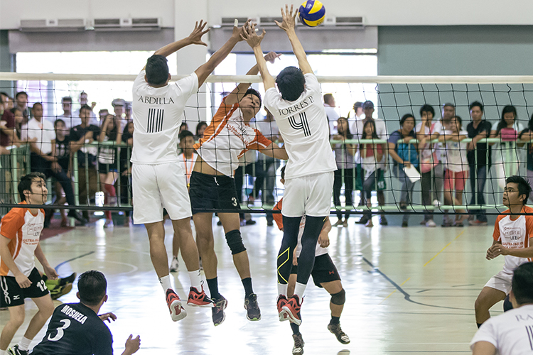 The Dasmarinas male team kicks off the exhibition games against the Bagwis volleyball superstars