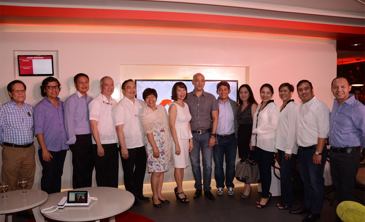 PLDT executives pose for a photo op with partners who made the flagship store come to life PLDT Head of Property & Facilities Management Martin Rio, PLDT Head of the Pasay Zone Cesar Embuscado, PLDT VP and Head of Consumer Credit & Business System Mgt. Ricky Sison, PLDT Head of Community Relations Evelyn del Rosario, PLDT Head of HOME Customer Care Business Dev. Weng Aquino, PLDT VP and Head of HOME Customer Care Head Paolo Lopez, PLDT EVP and Head of HOME Business Ariel Fermin, PLDT Head of HOME SSC Management Anna Fernando with  Optima Digital’s Tony Gloria & Pete Jimenez, Grace Capati Architecture & Design’s (GCAD) Grace Capati & Ronald Soriano   