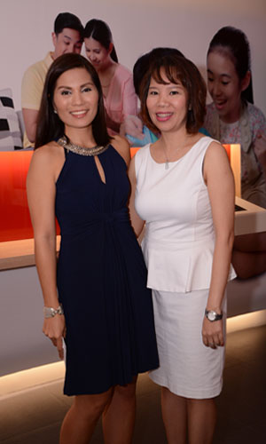Host Patricia Bermudez-Hizon with PLDT Head of HOME Customer Care Business Development  Weng Aquino