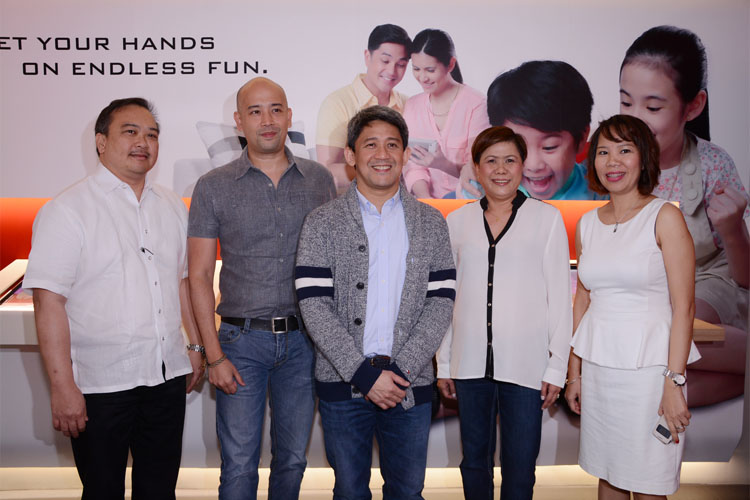 (L-R) PLDT FVP and Head of Consumer Credit & Business System Mgt. Ricky Sison, PLDT VP and Head of HOME Customer Care Head Paolo Lopez, PLDT EVP and Head of HOME Business Ariel Fermin, Pasay Sales & Service Center Supervisor Emi Sato, HOME Customer Care Business Dev. Head  Weng Aquino