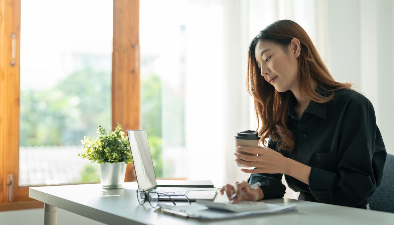 AI-Proof Asian Girl Doing Research