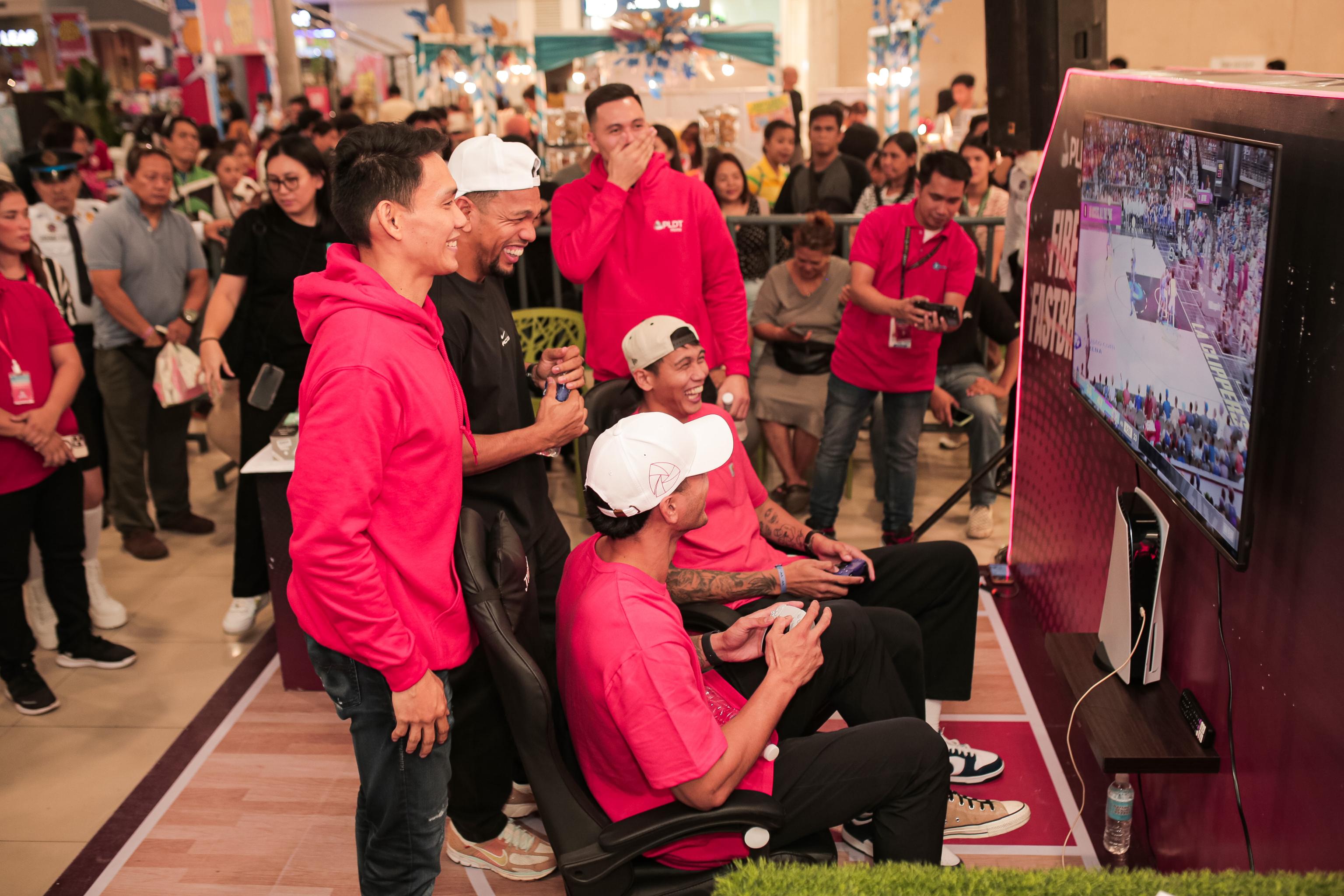 PBA stars show off their “off court” skills with a game of NBA 2K24 at the PLDT Home Fiber Fastbreak booth inside Gaisano Mall of Davao.